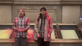 National Archives Rotunda evacuated after climate activists dump pink powder on case holding US Constitution
