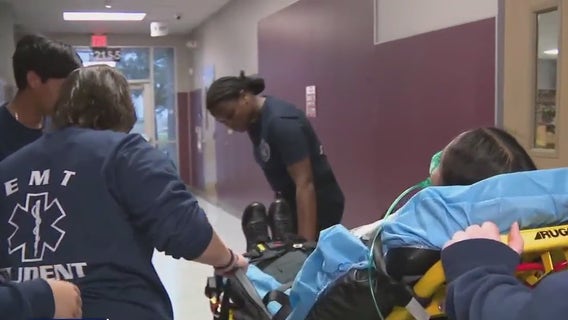 PfISD students getting hands-on firefighter and EMT training