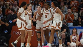 Moore’s 21 points and 10 rebounds lead No. 1 seed Texas past No. 8 Alabama 65-54
