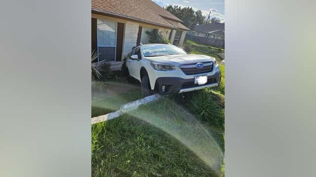 SUV crashes into home in Travis County
