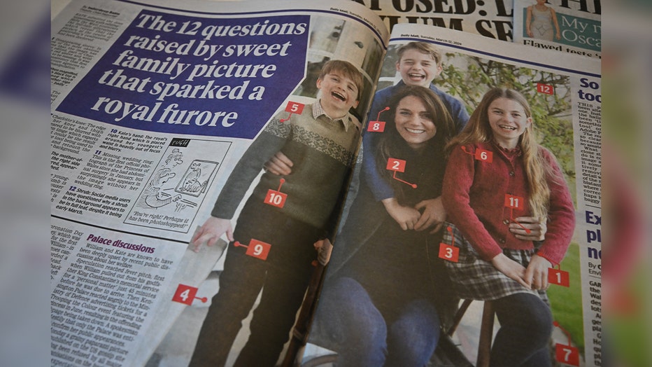 A picture shows stories in Britains national newspapers, about the altered mothers day photo released by Kensington Palace on March 10, of Britains Catherine, Princess of Wales and her children, in London on March 12, 2024. The Princess of Wales on Monday apologised and admitted to editing an official portrait of her released by the palace that prompted AFP and other agencies to withdraw the altered image. (Photo by PAUL ELLIS/AFP via Getty Images)