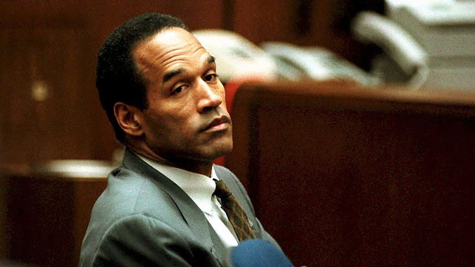 FILE - O. J. Simpson sits in Superior Court in Los Angeles on Dec. 8, 1994 during an open court session in the double murder case. (Photo credit: POOL/AFP via Getty Images)