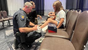 Hundreds of kids get new shoes at Round Rock PD's Step N2 Success event