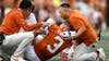 Texas QB Quinn Ewers departs with strained abdomen and Arch Manning takes over for Longhorns