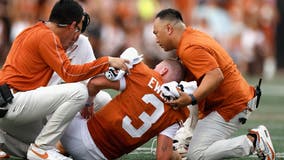 Texas QB Quinn Ewers departs with strained abdomen and Arch Manning takes over for Longhorns