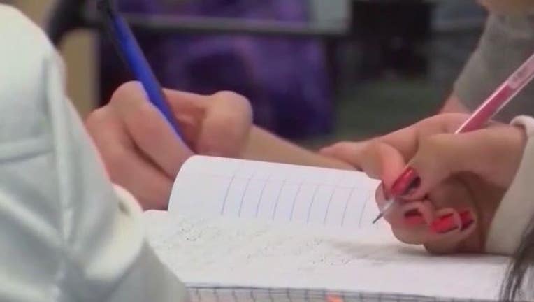 Students write in notebooks in a Texas classroom.