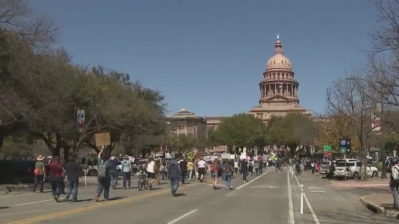 Central Texas groups march to protest Trump administration