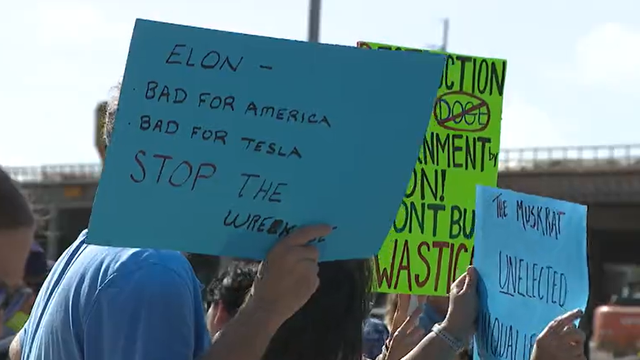Protesters gather outside North Austin Tesla for the second week in a row