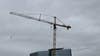 VIDEO: Man swings at edge of crane in downtown Austin
