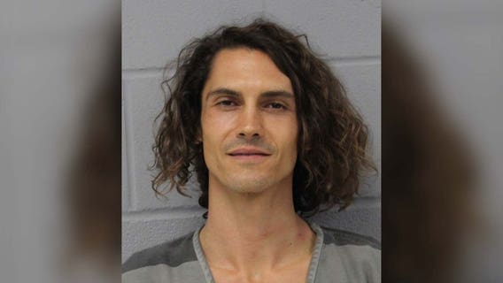 Austin police officer dragged on the back of motorcycle; Driver arrested, charged