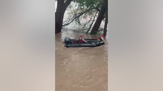 Texas flooding: Video shows woman's treetop perch after being swept away in Kerr County