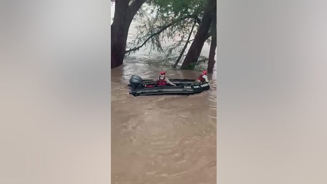 Texas flooding: Video shows woman's treetop perch after being swept away in Kerr County