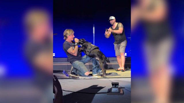 Austin man, his service dog steal Keith Urban show in Colorado