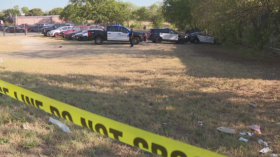 Woman found on ground behind auto repair shop; police investigate as homicide