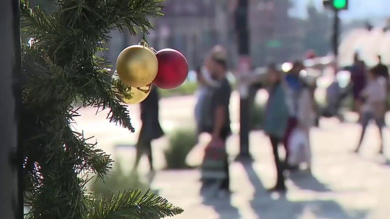 Shoppers brave long lines to do last-minute holiday shopping on Christmas Eve