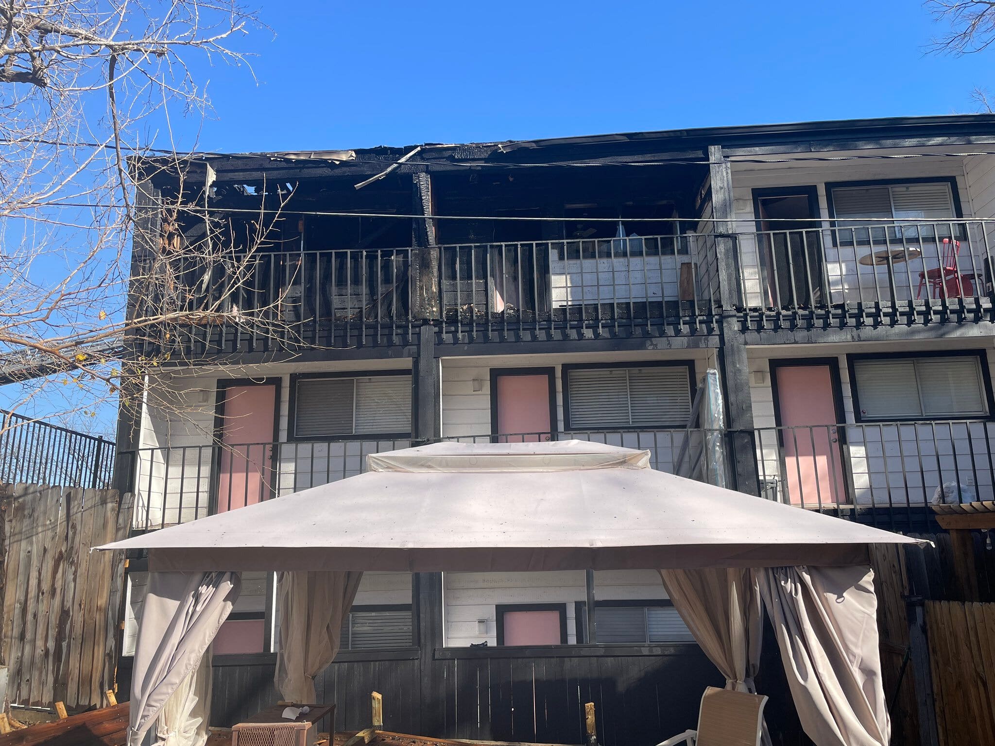 Firefighters work to put out fire at Austin condominium