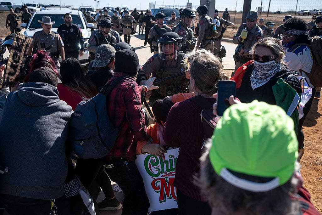 WATCH: Texas troopers, protesters clash outside ICE detention facility