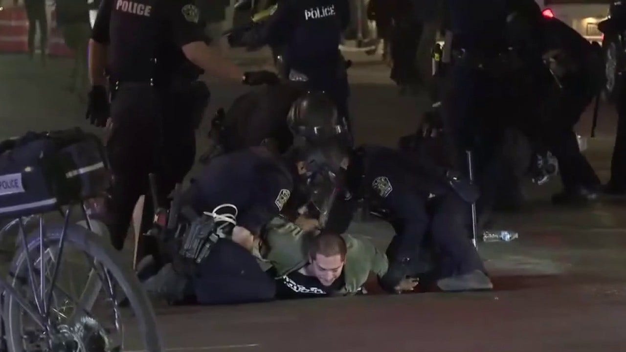 ICE protests in Austin: 5 arrested, charged for actions outside JJ Pickle building