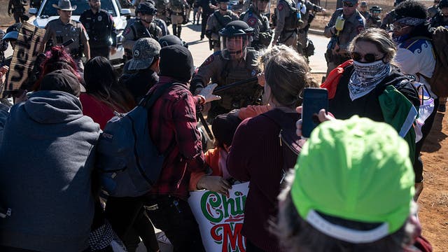 WATCH: Texas troopers, protesters clash outside ICE detention facility