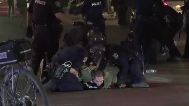 ICE protests in Austin: 5 arrested, charged for actions outside JJ Pickle building