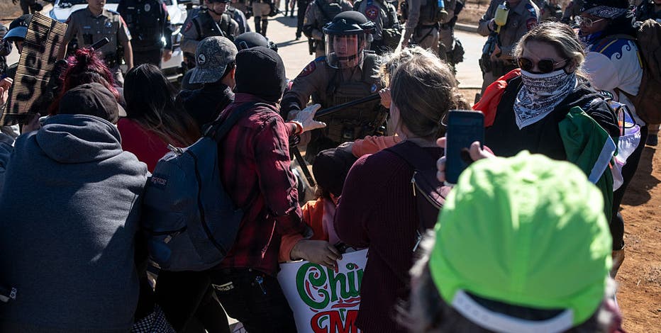 WATCH: Texas troopers, protesters clash outside ICE detention facility