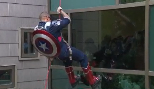 APD officers, healthcare workers rappel down Dell Children's dressed as superheroes