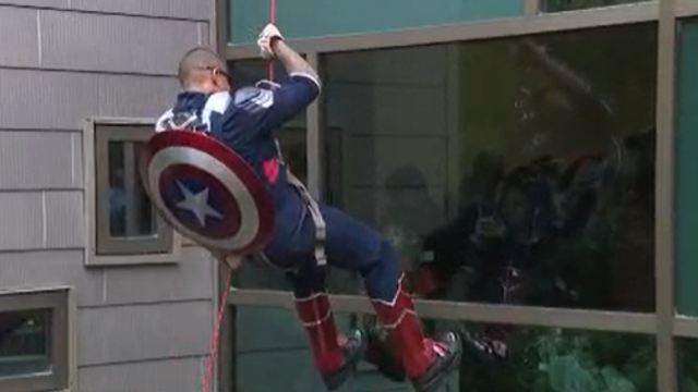 APD officers, healthcare workers rappel down Dell Children's dressed as superheroes