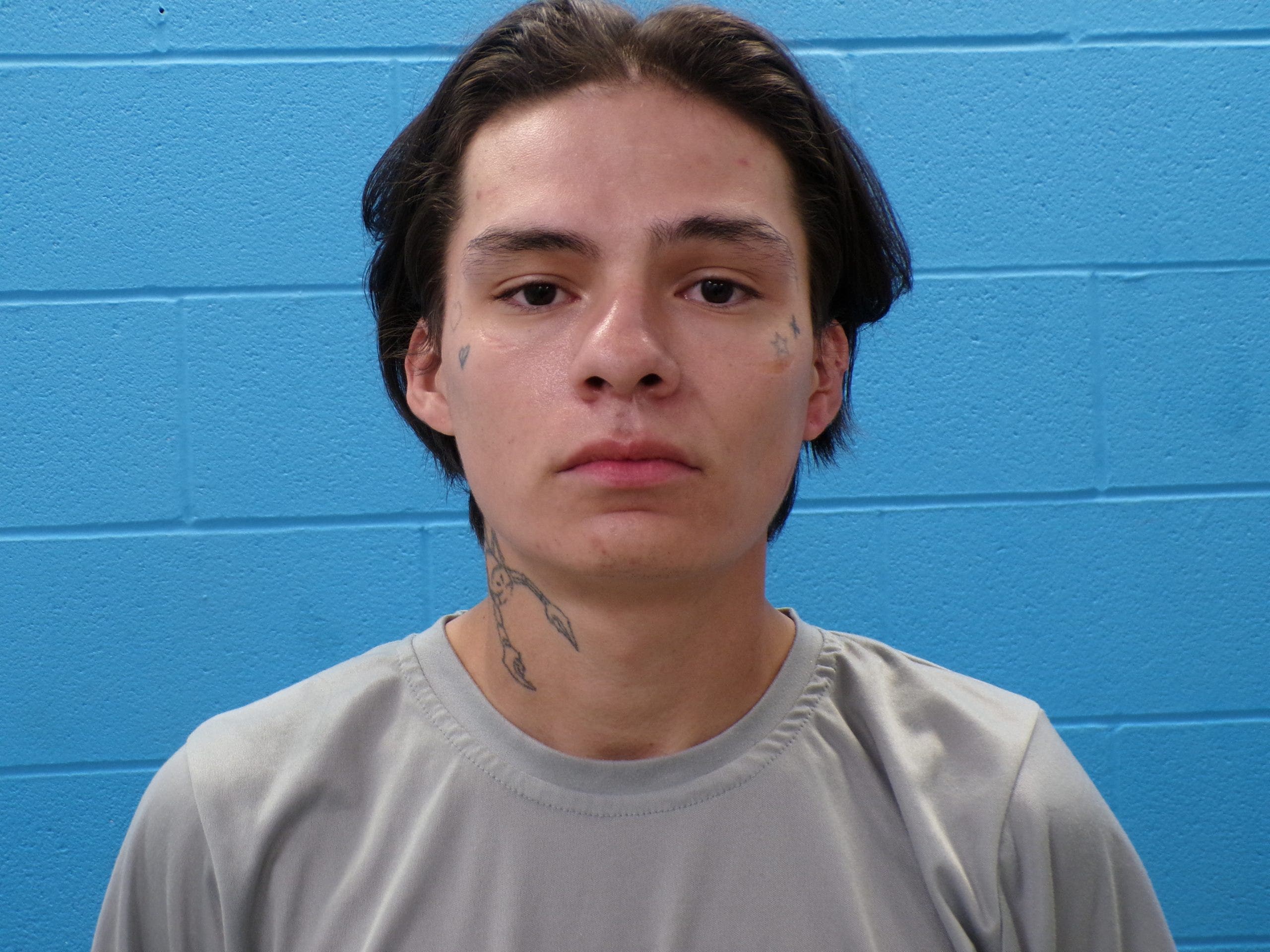 1 dead, 1 arrested after shooting at Budget Inn in Austin