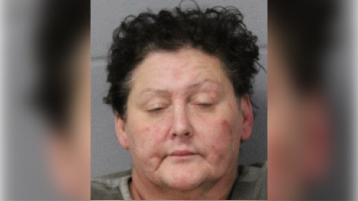 Woman charged in dog attack now accused of threatening city employees with AK-47