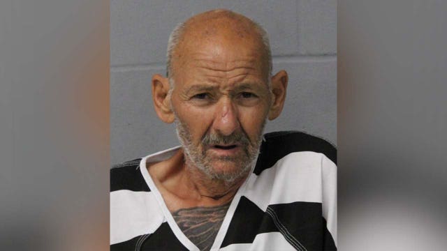 Man arrested in connection with body being found in trash can in South Austin