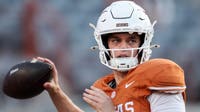 Texas hangs on to beat Ole Miss 34-27 after blowing 21-point lead