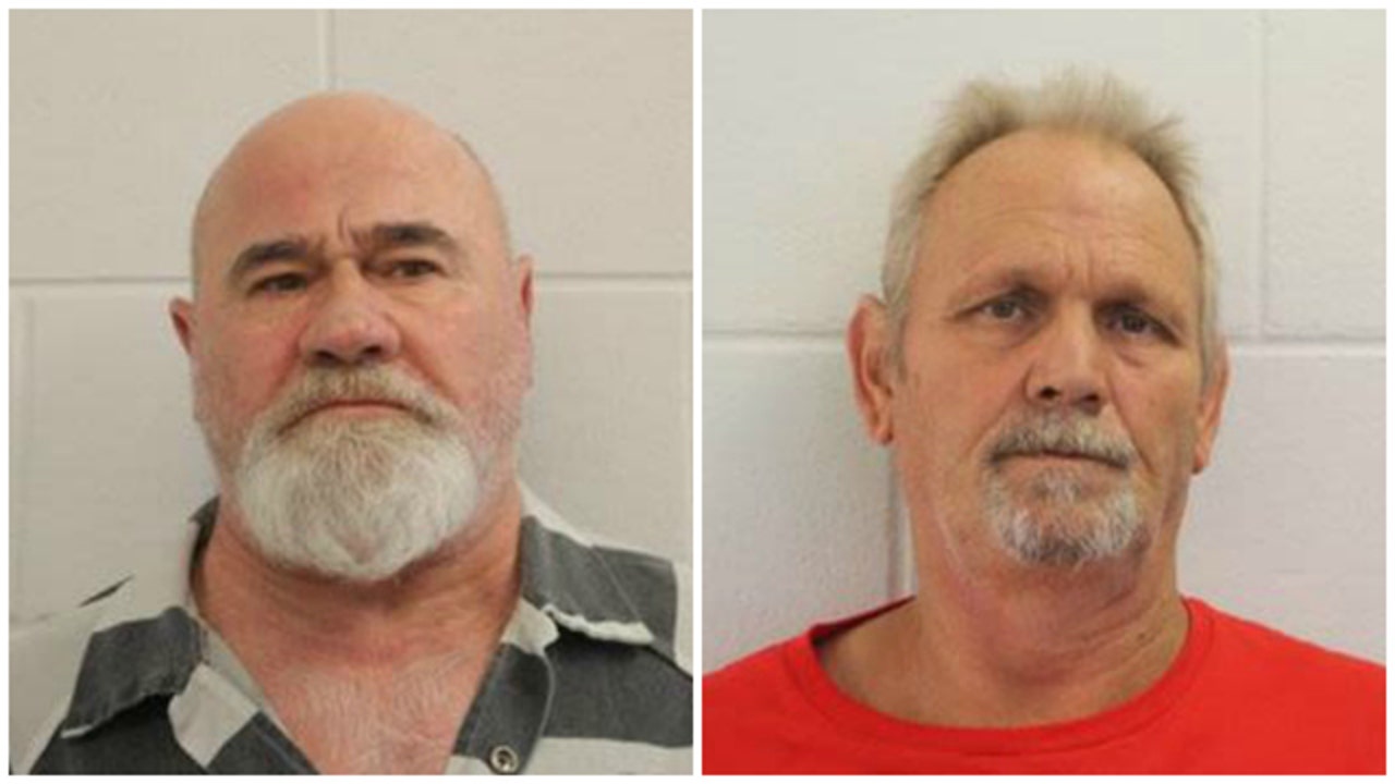 Men charged with murdering black man because he socialized with a white woman image