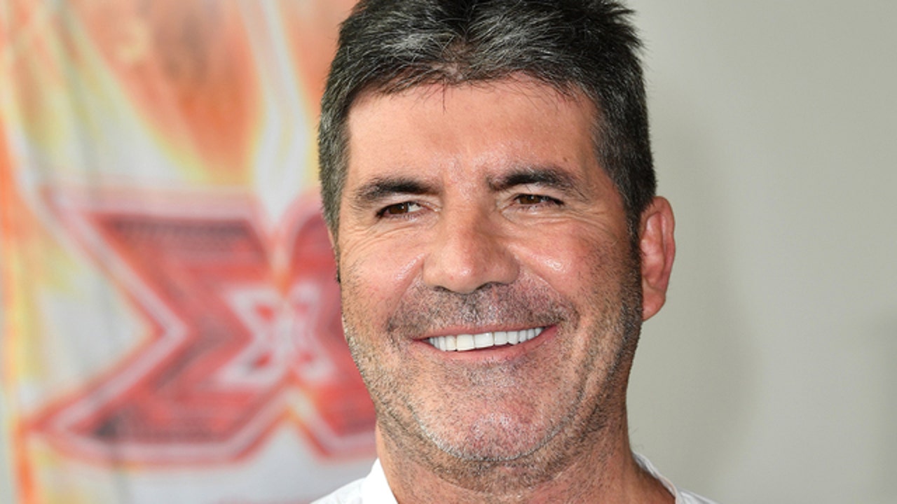 Simon Cowell taken to hospital after fall