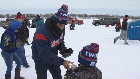 Twins Caravan tries Madison Lake ice fishing