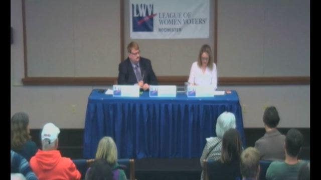 MN lawmaker apologizes for yanking mic from opponent