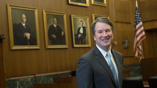 Trump picks Kavanaugh for court, setting up fight with Dems