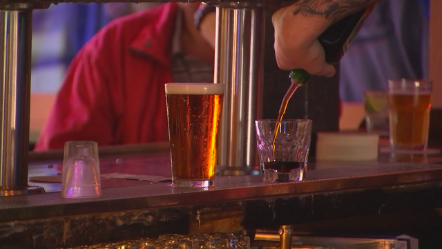 Man kicked out of Wisconsin bar shoots through window, injuring patron