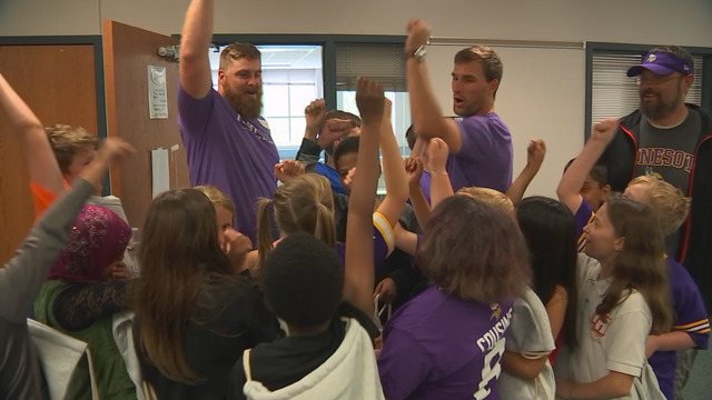 Vikings, Cousins run football drills with Mendota Heights students