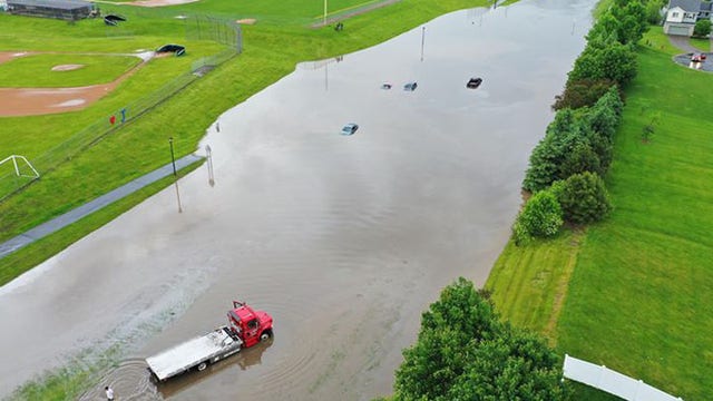 Flooding strands cars near Lakeville North High School