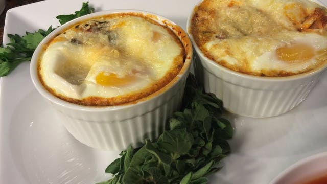 Baked eggs with tomato sauce, sweet potato chili, kale chicken salad
