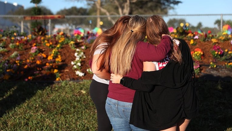 1202579c-GETTY_parkland anniversary_032419_1553445771136.png-402429.jpg