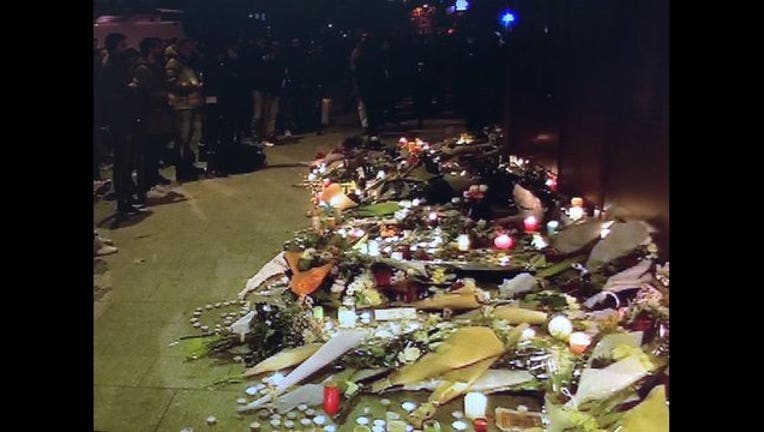 20e2d05f-PARIS ATTACKS VIGIL_1447531865439.jpg