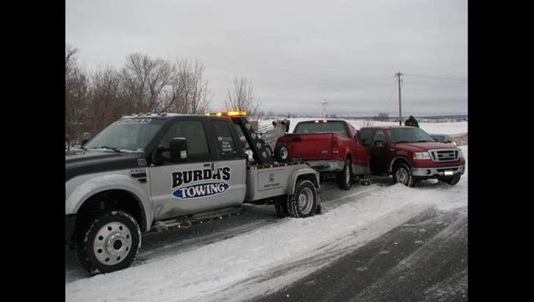tow truck crash_1451433293410.jpg