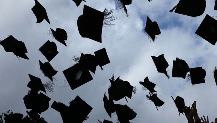 23afc140-GETTY graduation hats_1552759682714.png-402429.jpg