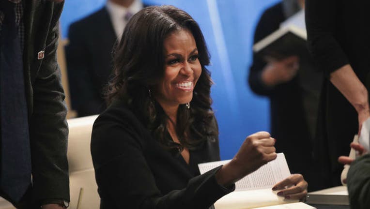 24821746-GETTY michelle obama becoming _1544536055844.jpg.jpg