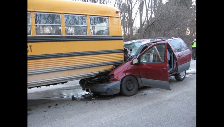 61c01a70-school bus crash with mini van_1491619045191.JPG