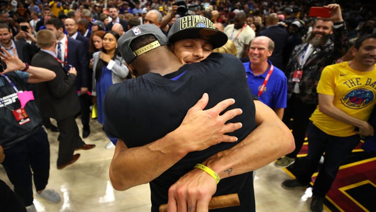 6be1c6a4-GettyImages-Golden-State-NBA-champs2018_1528516252070-402429.jpg