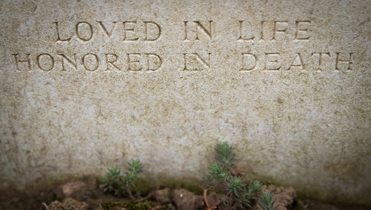 7c56f0c8-grave_GETTY_1531521936491.jpg