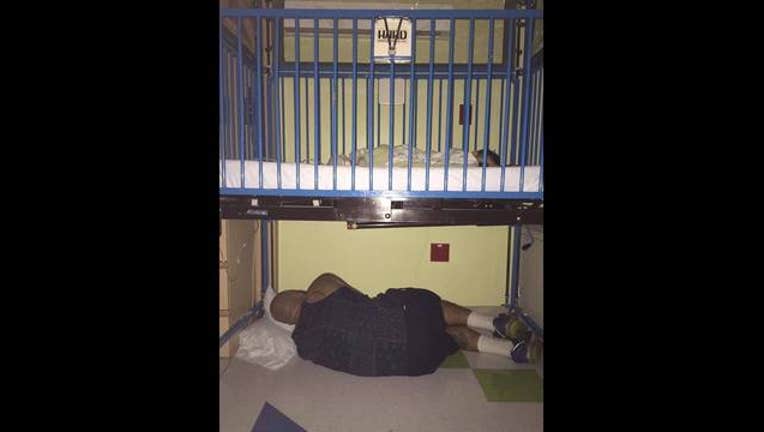 Dad Sleeps Under Crib_1467917156768-401096.jpg