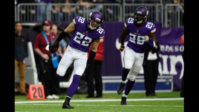 bf369e0d-Xavier Rhodes and Harrison Smith GETTY